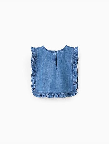 Top estilo poncho vaquero con volantes y bordado