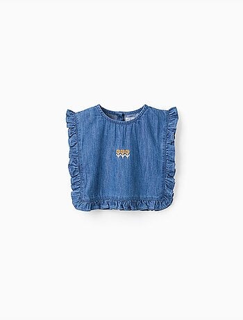 Top estilo poncho vaquero con volantes y bordado
