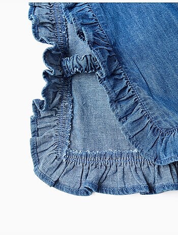 Top estilo poncho vaquero con volantes y bordado