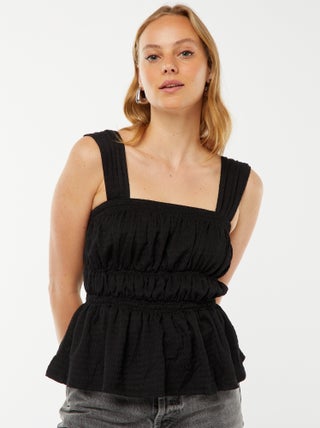 Top liso con tirantes de punto gofrado