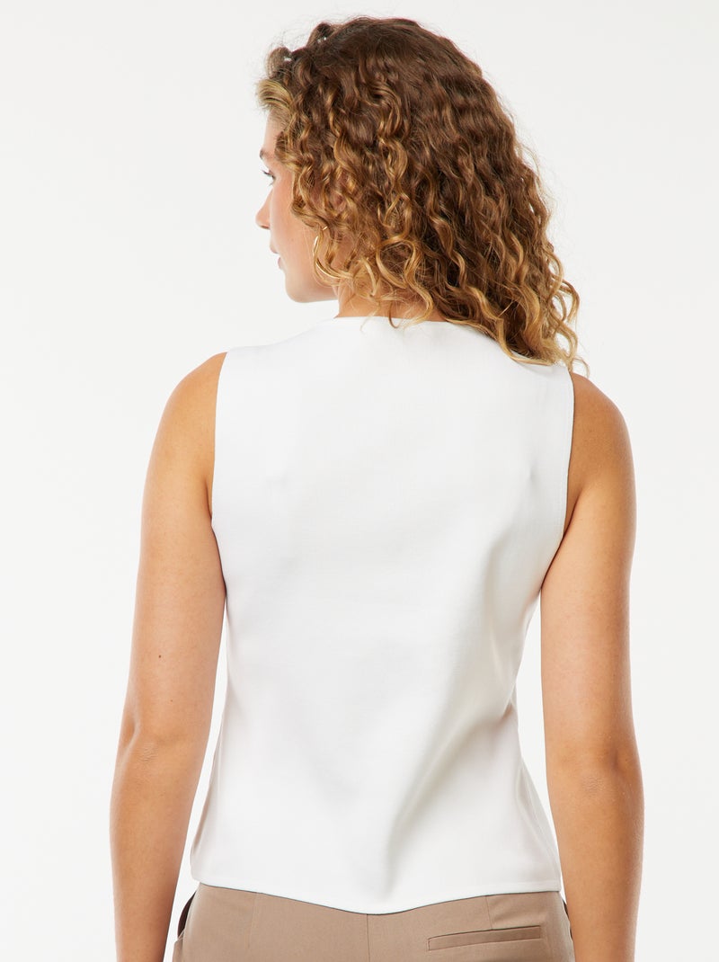 Top sin mangas con botones dorados blanco - Kiabi