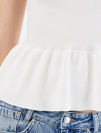 Top sin mangas peplum de canalé