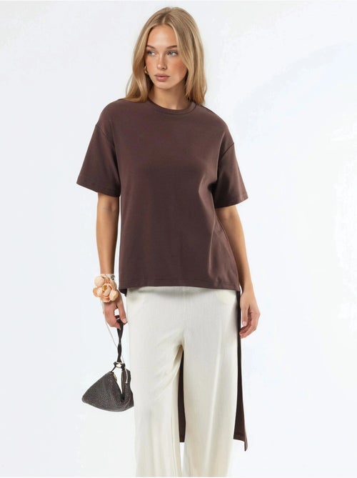 Túnica oversize con cuello redondo y abertura busem - Kiabi Túnica oversize con cuello redondo y abertura busem - Kiabi