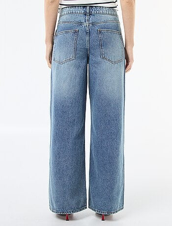 Vaquero ancho con doble abertura abotonada