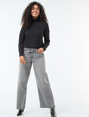 Vaquero ancho con doble abertura abotonada