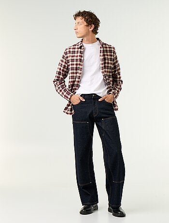 Vaquero baggy liso con apliques de fantasía