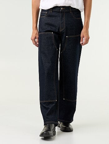 Vaquero baggy liso con apliques de fantasía