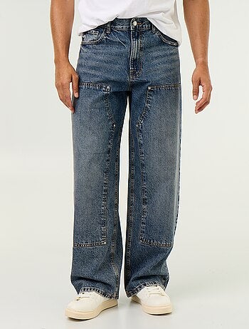 Vaquero baggy liso con apliques de fantasía