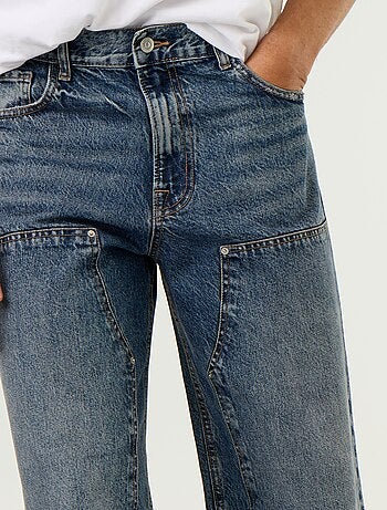 Vaquero baggy liso con apliques de fantasía