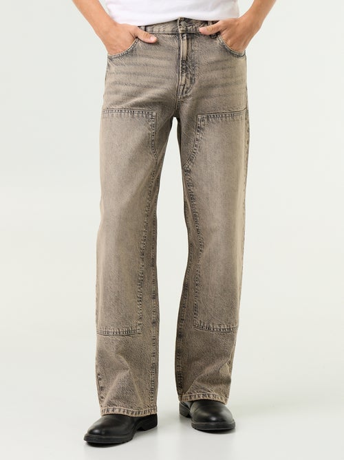 Vaquero baggy liso con apliques de fantasía - Kiabi Vaquero baggy liso con apliques de fantasía - Kiabi