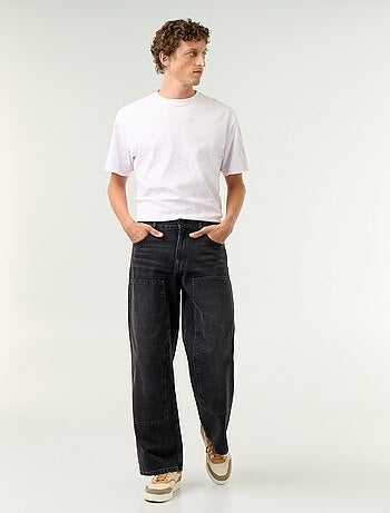 Vaquero baggy liso con apliques de fantasía