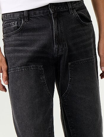 Vaquero baggy liso con apliques de fantasía