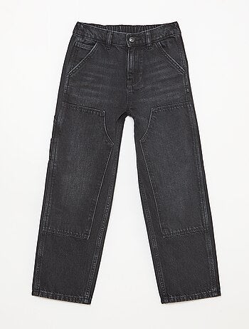 Vaquero con cortes en las rodillas