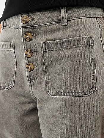 Vaquero de tiro alto con botones