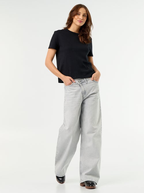 Vaquero wide con tapeta de botones descentrada - Kiabi Vaquero wide con tapeta de botones descentrada - Kiabi