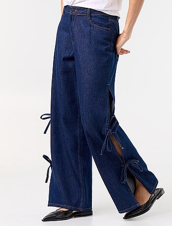 Vaquero wide leg ancho con nudos fantasía en el bajo
