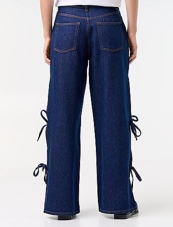 Vaquero wide leg ancho con nudos fantasía en el bajo