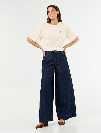 Vaquero wide leg con bolsillos recortados