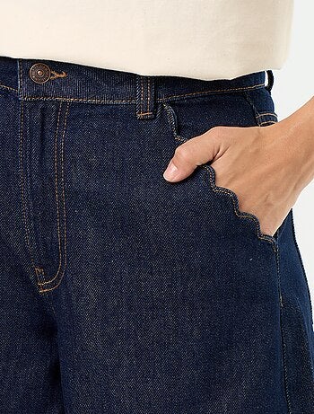 Vaquero wide leg con bolsillos recortados