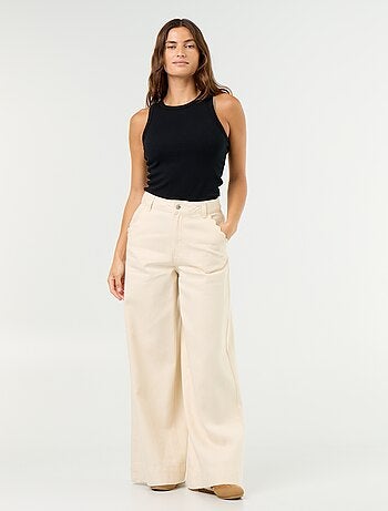 Vaquero wide leg con bolsillos recortados