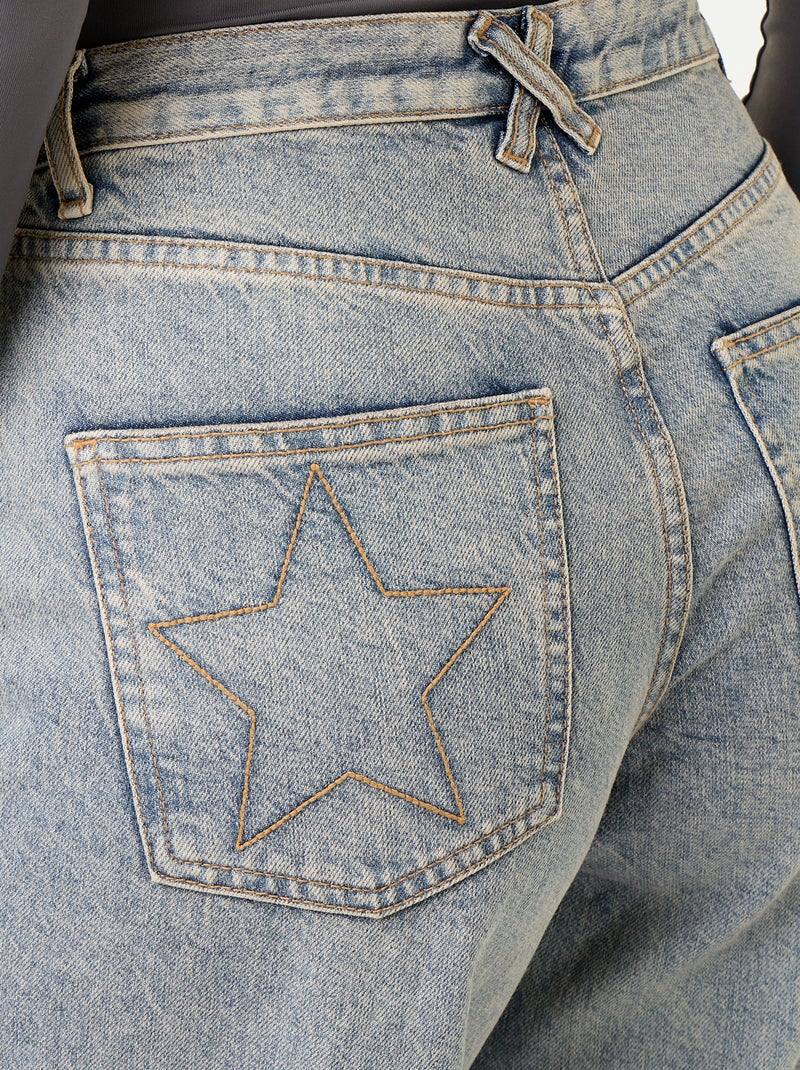 Vaquero wide leg con estrellas bordadas en los bolsillos traseros Azul - Kiabi