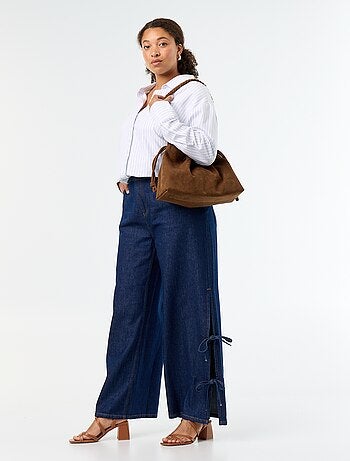 Vaquero wide leg con lazos fantasía en los laterales