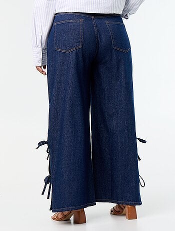 Vaquero wide leg con lazos fantasía en los laterales