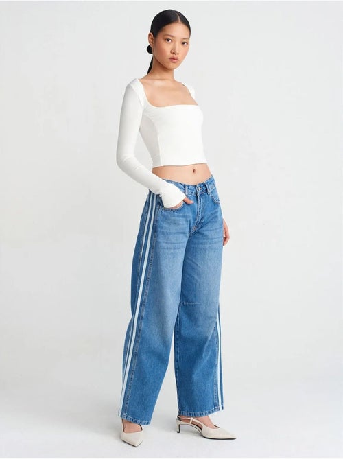 Vaqueros de denim a rayas de tiro alto y pernera ancha dilvin - Kiabi Vaqueros de denim a rayas de tiro alto y pernera ancha dilvin - Kiabi