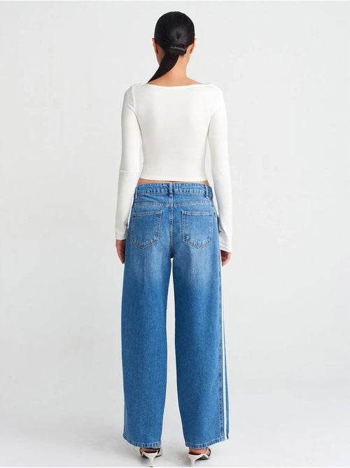 Vaqueros de denim a rayas de tiro alto y pernera ancha dilvin - Kiabi Vaqueros de denim a rayas de tiro alto y pernera ancha dilvin - Kiabi