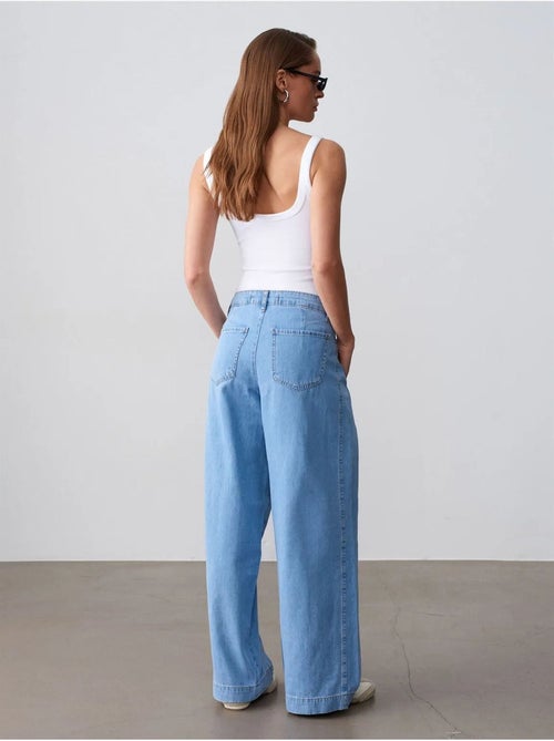 Vaqueros de denim de algodón de tiro alto y pernera ancha dilvin - Kiabi Vaqueros de denim de algodón de tiro alto y pernera ancha dilvin - Kiabi