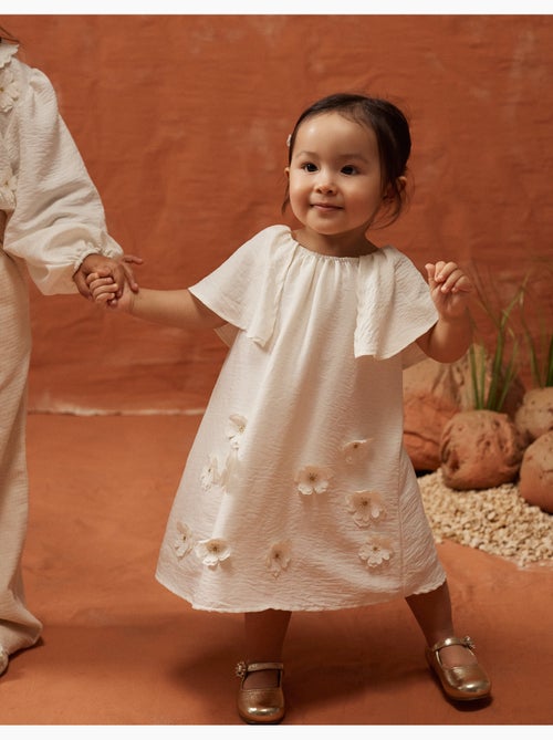 Vestido con aplique floral + cubrepañal - Kiabi