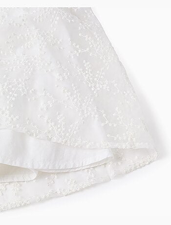 Vestido con lazo y mangas estilo capa