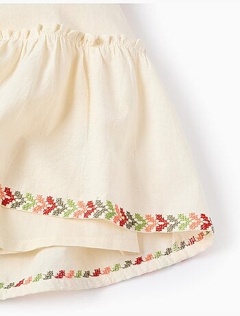 Vestido con mangas abullonadas y bordado