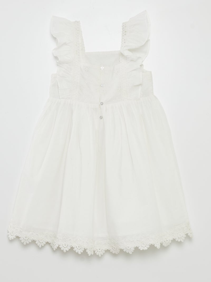 Vestido con volante y bordados BLANCO - Kiabi