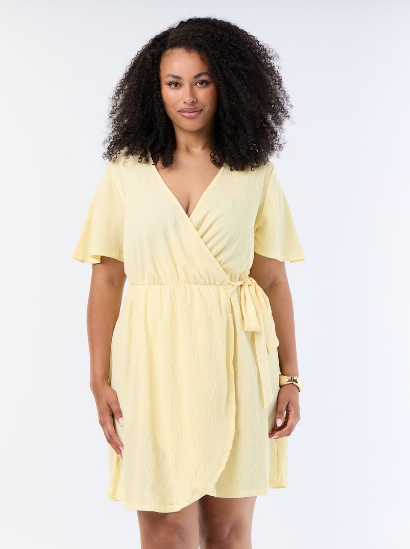 Vestido cruzado de punto gofrado Amarillo - Kiabi