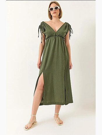 Vestido de lino con escote en v, cintura elástica, abertura y detalle de lazo de bianco lucci