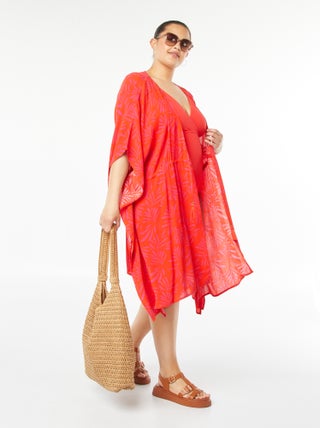 Vestido de playa abierto y estampado