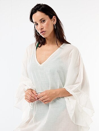 Vestido de playa con sisas con volantes