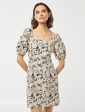 Vestido evasé corto con lazo trasero