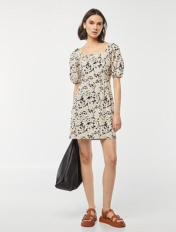 Vestido evasé corto con lazo trasero