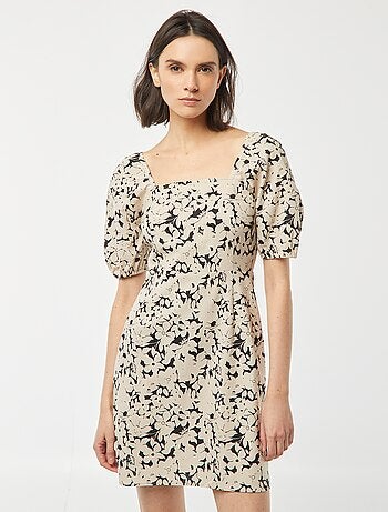 Vestido evasé corto con lazo trasero