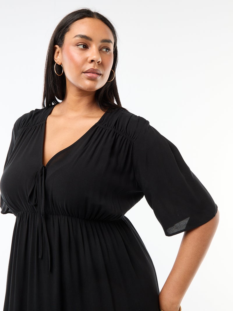 Vestido fluido con estampado fantasía Negro - Kiabi