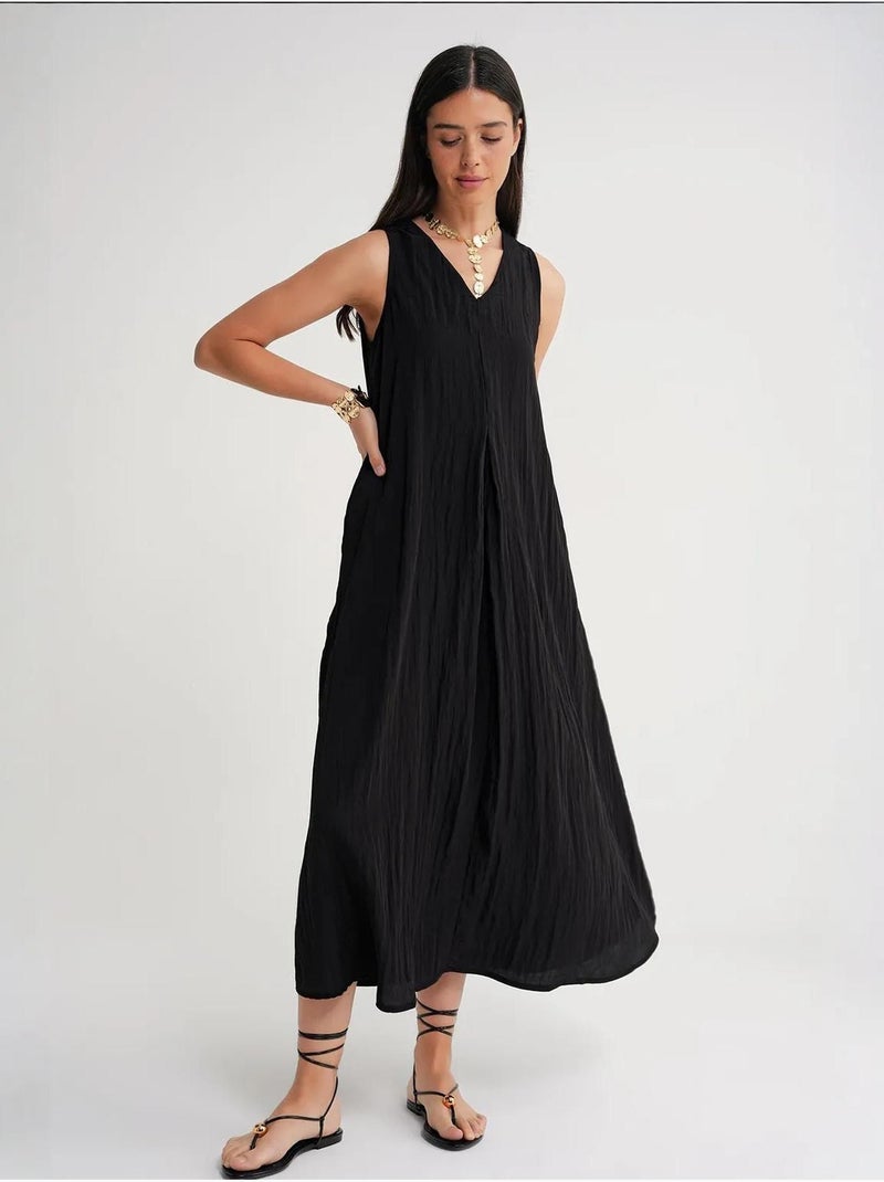 Vestido largo con cuello en v y tela seersucker mixray Negro - Kiabi