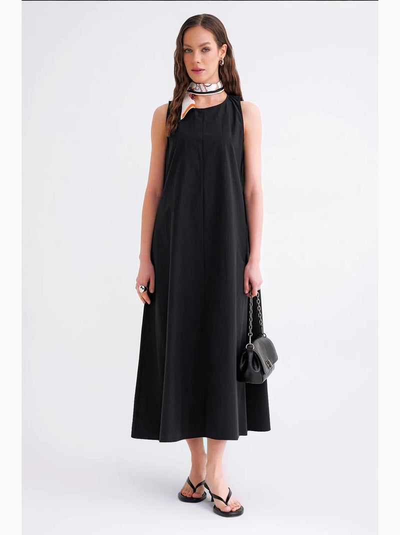 Vestido largo de corte relajado con cierre de botones y bolsillos mixray Negro - Kiabi