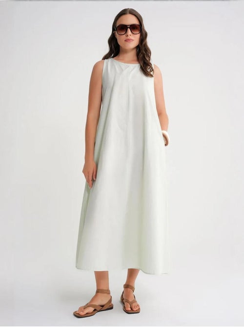 Vestido largo de corte relajado con cierre de botones y bolsillos mixray - Kiabi Vestido largo de corte relajado con cierre de botones y bolsillos mixray - Kiabi