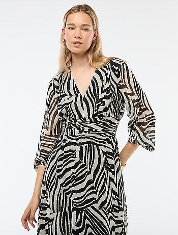 Vestido largo estampado con base con volantes