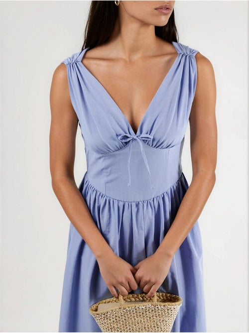 Vestido midi con escote en v y detalle de lazo de busem - Kiabi Vestido midi con escote en v y detalle de lazo de busem - Kiabi
