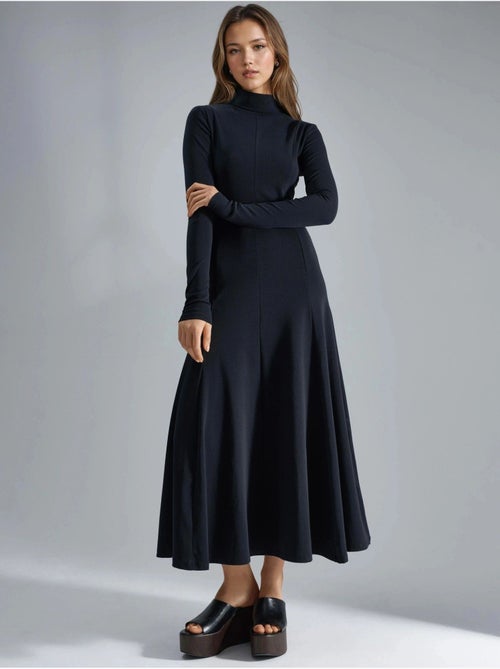 Vestido midi de corte a con cuello barco y manga larga busem - Kiabi Vestido midi de corte a con cuello barco y manga larga busem - Kiabi