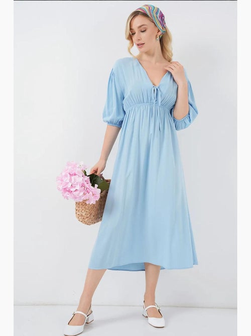Vestido midi de corte a con escote en v y detalle de ribete bdart - Kiabi Vestido midi de corte a con escote en v y detalle de ribete bdart - Kiabi