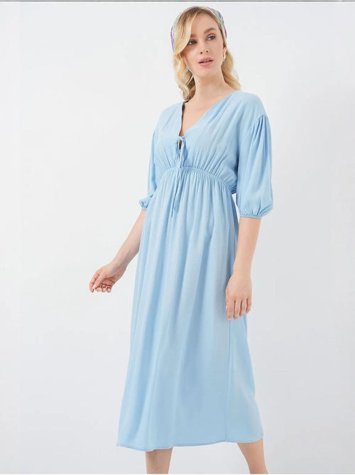 Vestido midi de corte a con escote en v y detalle de ribete bdart - Kiabi Vestido midi de corte a con escote en v y detalle de ribete bdart - Kiabi